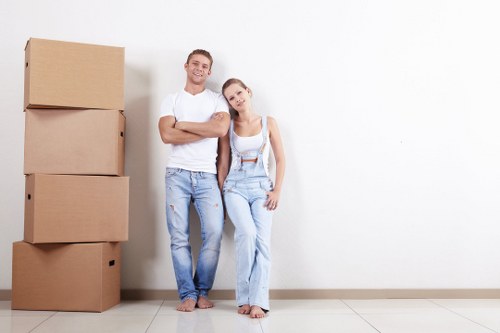 Professional house removalists loading furniture in Merton