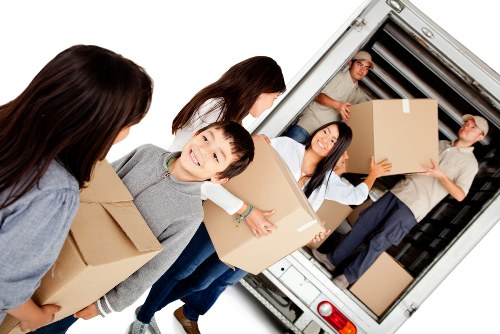Office removals planning in Merton with boxes and workspace equipment