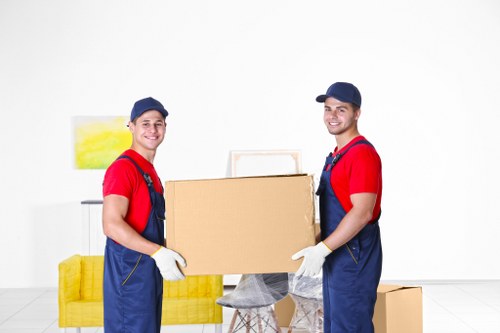 Flat removals planning in Merton with packed boxes and moving preparation