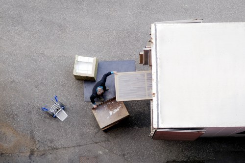 Van moving service team preparing items safely for transport