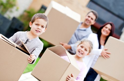 Unpacking boxes and arranging a new home with packing services in Merton