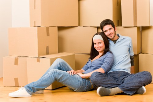 Packed office equipment prepared for relocation in Merton