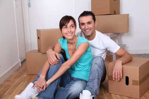 Packed office boxes and furniture ready for a business move
