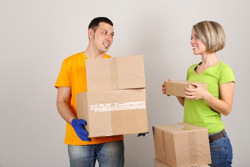 Protected furniture items ready for transport during removals in Merton